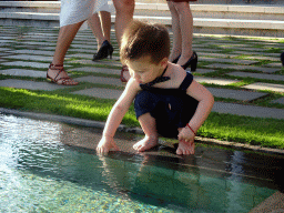 Max at the pond in front of the altar at the Tirtha Wedding Chapel