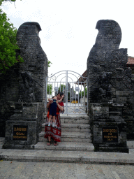 Miaomiao and Max at a gate at the Pura Luhur Uluwatu temple