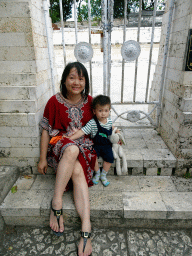 Miaomiao and Max at a gate at the Pura Luhur Uluwatu temple