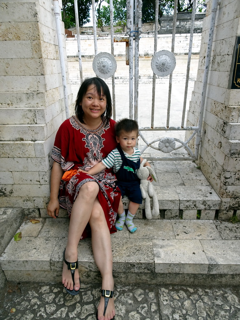 Miaomiao and Max at a gate at the Pura Luhur Uluwatu temple