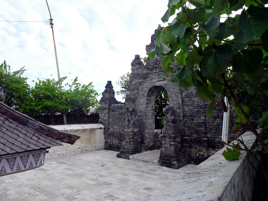 Gate with statues at the Pura Luhur Uluwatu temple