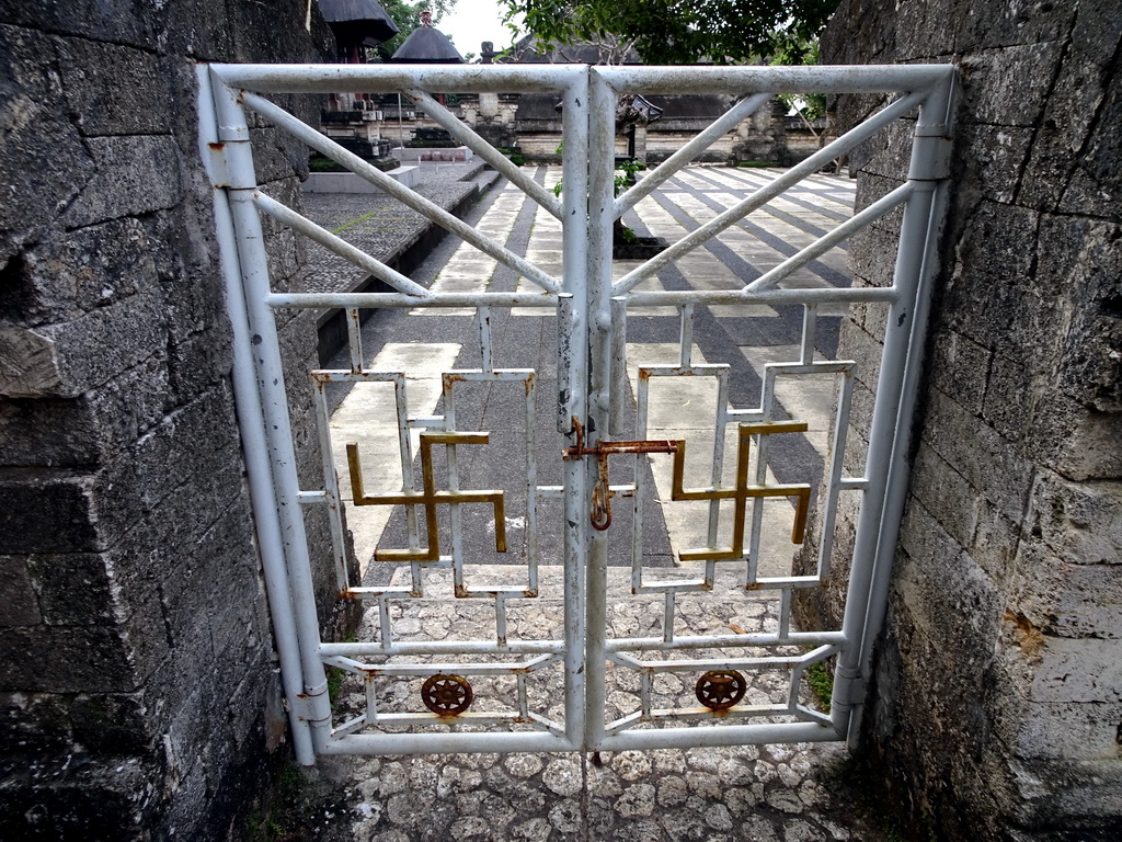 Gate with swastikas at the Pura Luhur Uluwatu temple