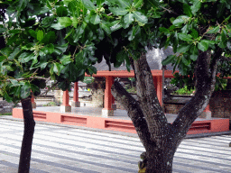 Trees and pavilion at the Pura Luhur Uluwatu temple