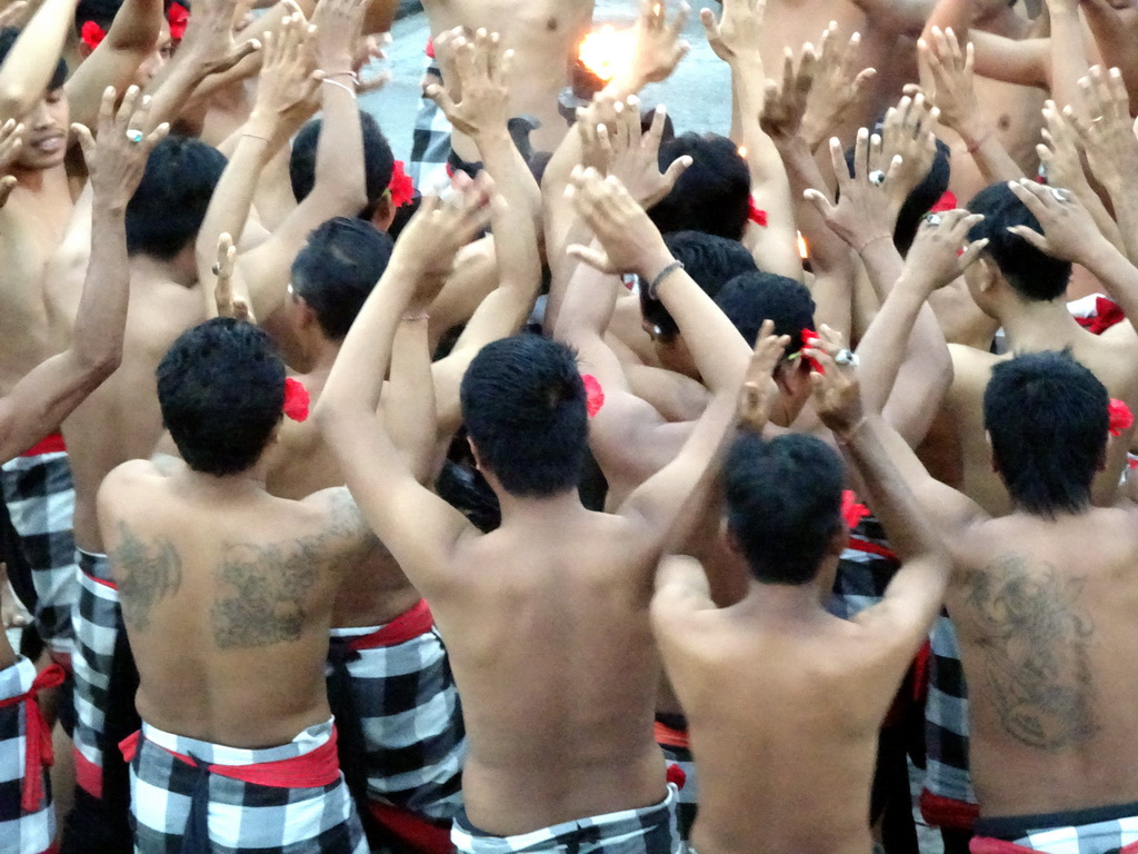 People performing the Sanghyang dance during the Kecak and Fire Dance at the Amphitheatre of the Pura Luhur Uluwatu temple