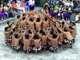 People performing the Sanghyang dance during the Kecak and Fire Dance at the Amphitheatre of the Pura Luhur Uluwatu temple