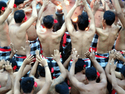 People performing the Sanghyang dance during the Kecak and Fire Dance at the Amphitheatre of the Pura Luhur Uluwatu temple