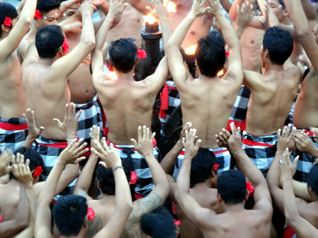 People performing the Sanghyang dance during the Kecak and Fire Dance at the Amphitheatre of the Pura Luhur Uluwatu temple