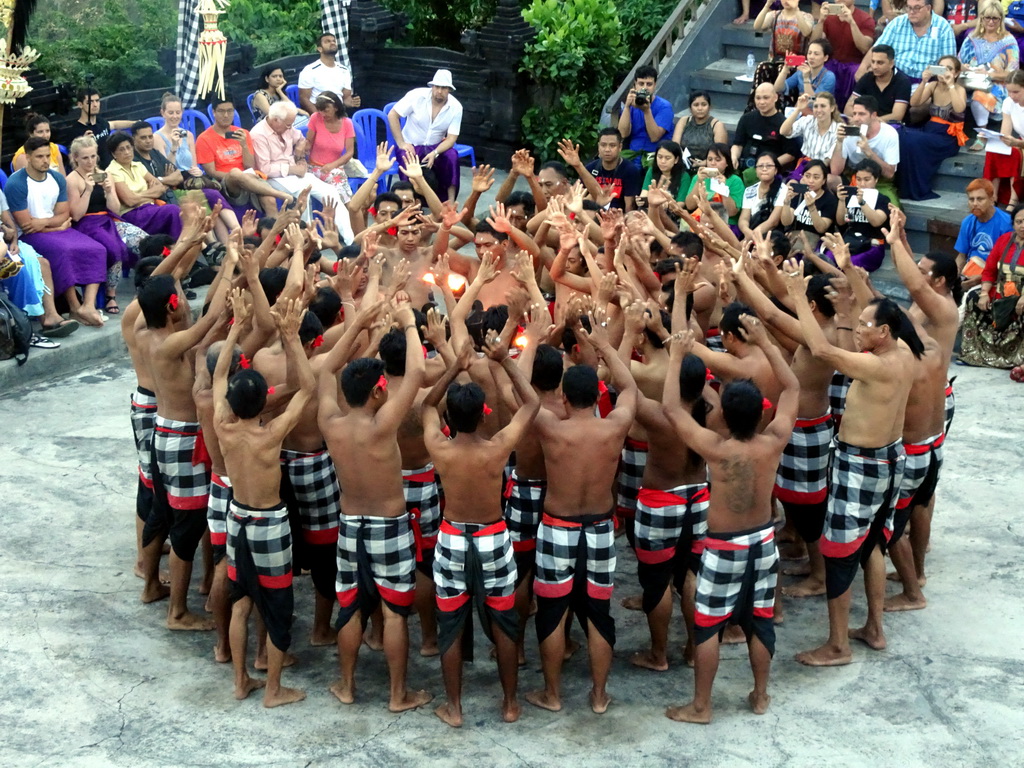 People performing the Sanghyang dance during the Kecak and Fire Dance at the Amphitheatre of the Pura Luhur Uluwatu temple