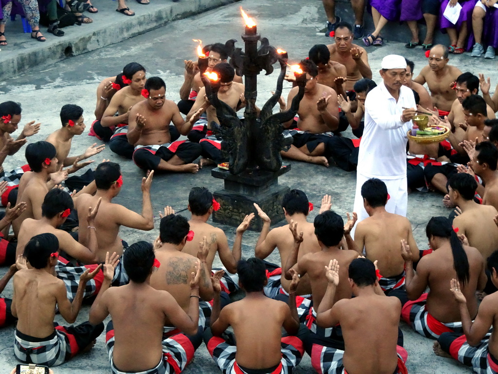 People performing the Sanghyang dance during the Kecak and Fire Dance at the Amphitheatre of the Pura Luhur Uluwatu temple