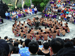 People performing the Sanghyang dance during the Kecak and Fire Dance at the Amphitheatre of the Pura Luhur Uluwatu temple