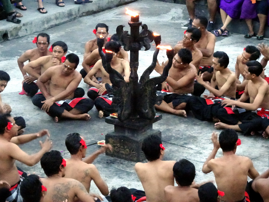 People performing the Sanghyang dance during the Kecak and Fire Dance at the Amphitheatre of the Pura Luhur Uluwatu temple