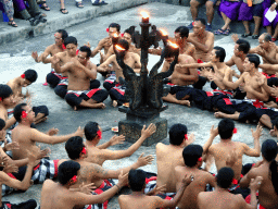 People performing the Sanghyang dance during the Kecak and Fire Dance at the Amphitheatre of the Pura Luhur Uluwatu temple