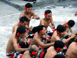 People performing the Sanghyang dance during the Kecak and Fire Dance at the Amphitheatre of the Pura Luhur Uluwatu temple