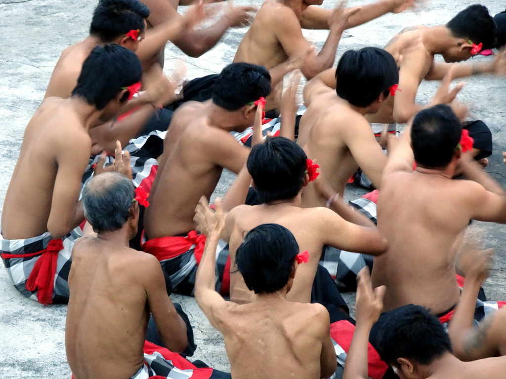 People performing the Sanghyang dance during the Kecak and Fire Dance at the Amphitheatre of the Pura Luhur Uluwatu temple