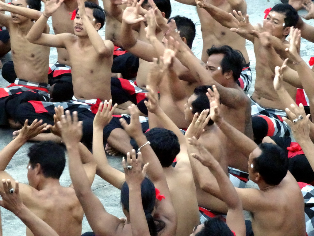 People performing the Sanghyang dance during the Kecak and Fire Dance at the Amphitheatre of the Pura Luhur Uluwatu temple