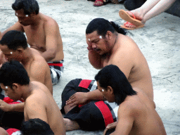 People performing the Sanghyang dance during the Kecak and Fire Dance at the Amphitheatre of the Pura Luhur Uluwatu temple