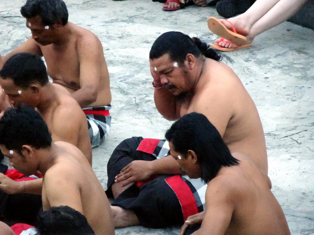 People performing the Sanghyang dance during the Kecak and Fire Dance at the Amphitheatre of the Pura Luhur Uluwatu temple