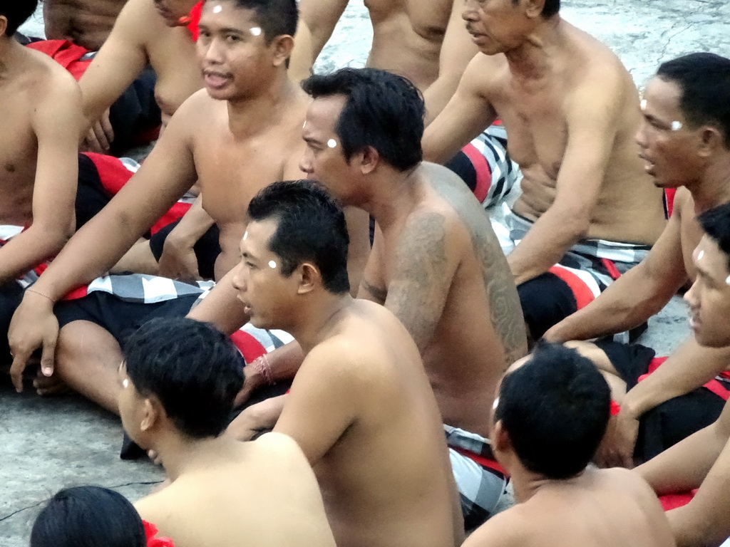 People performing the Sanghyang dance during the Kecak and Fire Dance at the Amphitheatre of the Pura Luhur Uluwatu temple