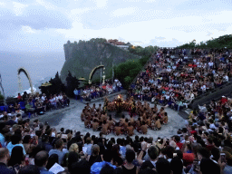 The Amphitheatre of the Pura Luhur Uluwatu temple, with Rama, Sita and Laksamana during Act 1 of the Kecak and Fire Dance, at sunset