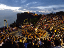 The Amphitheatre of the Pura Luhur Uluwatu temple, with Haruman during Act 3 of the Kecak and Fire Dance, at sunset