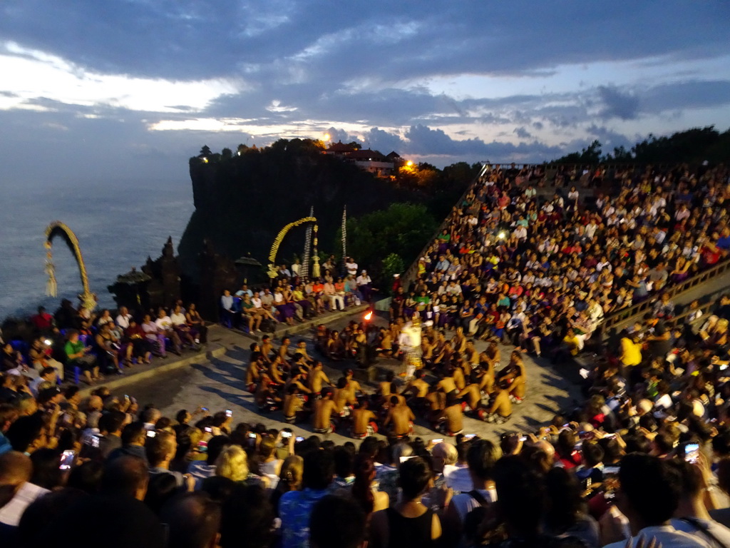 The Amphitheatre of the Pura Luhur Uluwatu temple, with Haruman during Act 3 of the Kecak and Fire Dance, at sunset