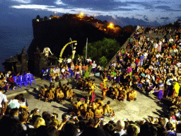 The Amphitheatre of the Pura Luhur Uluwatu temple, with Haruman, Sita and Trijata during Act 4 of the Kecak and Fire Dance, by night