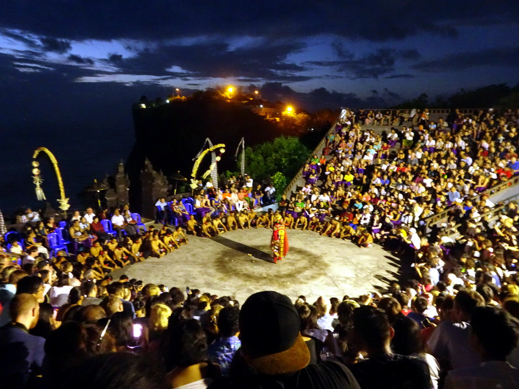 The Amphitheatre of the Pura Luhur Uluwatu temple, with a Giant during Act 4 of the Kecak and Fire Dance, by night