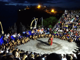 The Amphitheatre of the Pura Luhur Uluwatu temple, with a Giant during Act 4 of the Kecak and Fire Dance, by night
