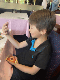 Max with Pokémon cards at the Tai Soen restaurant at the Hoog Catharijne shopping mall