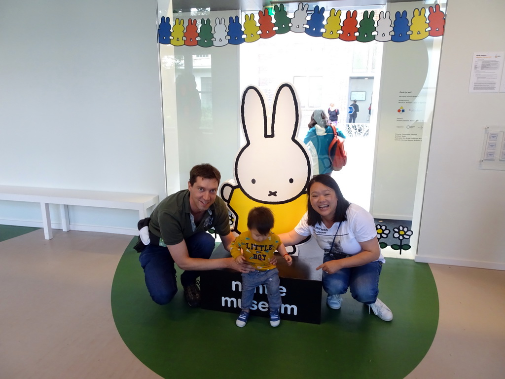 Tim, Miaomiao and Max with a statue of Nijntje at the entrance of the Nijntje Museum