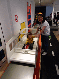 Miaomiao and Max in a small bus at the Traffic Room at the upper floor of the Nijntje Museum