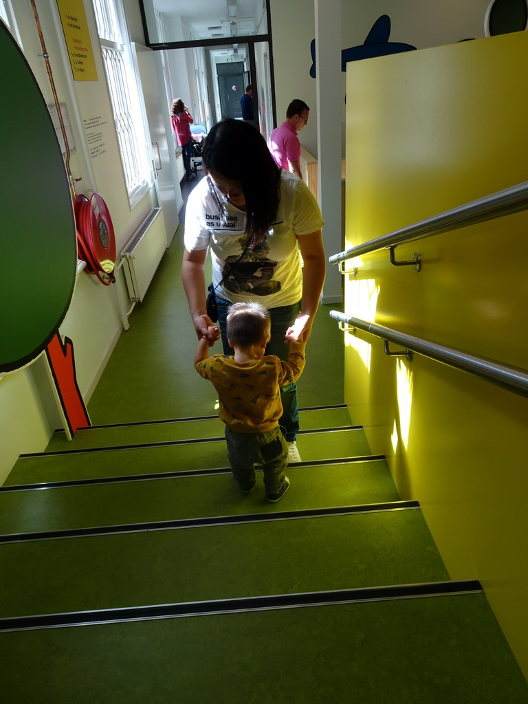 Miaomiao and Max on a staircase at the upper floor of the Nijntje Museum