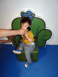 Max with a telephone at the Museum Room at the ground floor of the Nijntje Museum