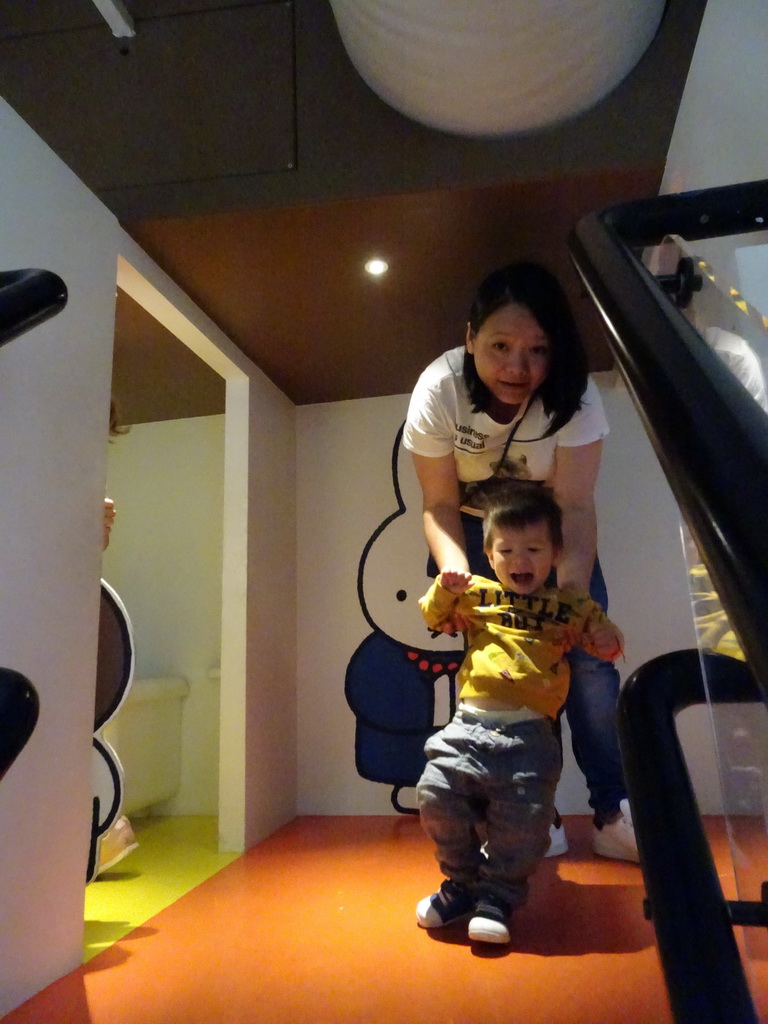 Miaomiao and Max on top of the staircase at Nijntje`s House at the ground floor of the Nijntje Museum