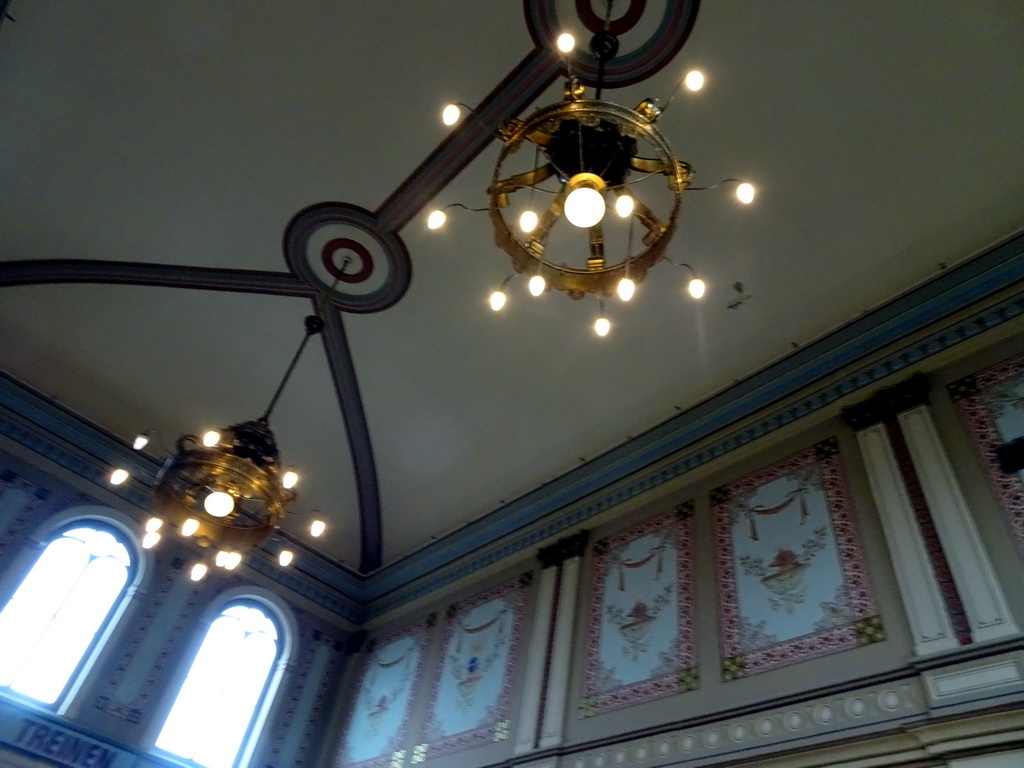 Chandeleers at the ceiling of the main hall of the Maliebaanstation building of the Spoorwegmuseum