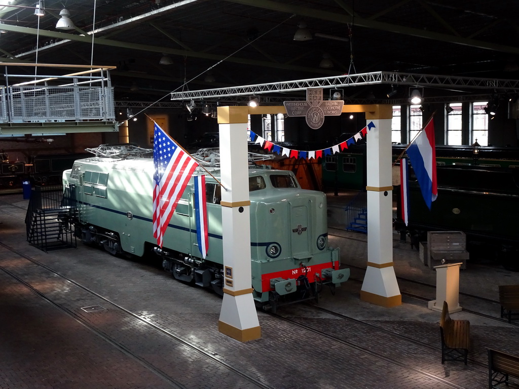 Old train at the Werkplaats hall of the Spoorwegmuseum, viewed from the upper walkway