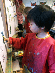 Max painting at the Art Room at the upper floor of the Nijntje Winter Museum