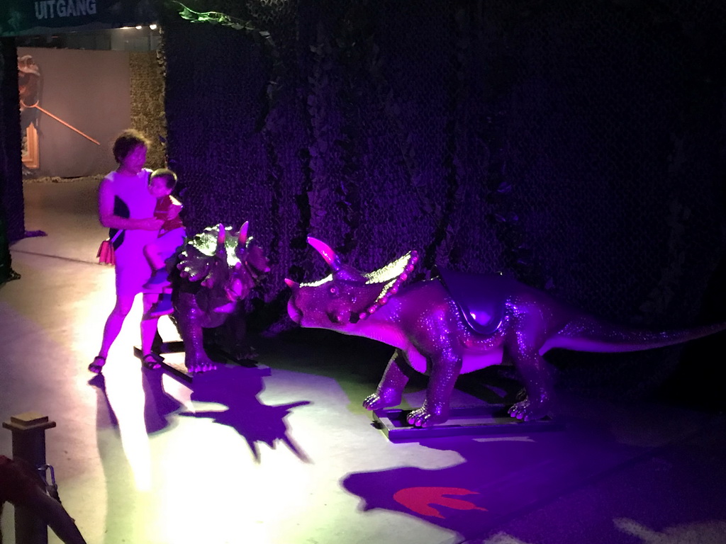 Miaomiao and Max with Triceratops statues at the entrance to the World of Dinos exhibition at the Jaarbeurs building