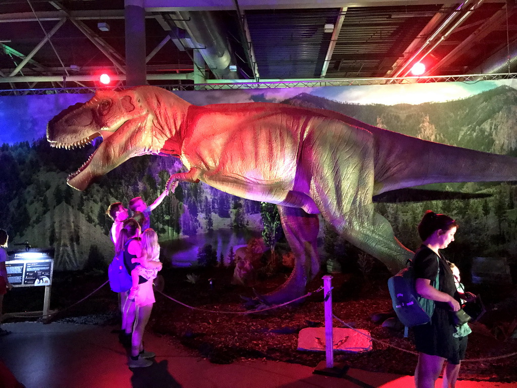 Tyrannosaurus Rex statue at the World of Dinos exhibition at the Jaarbeurs building, with explanation