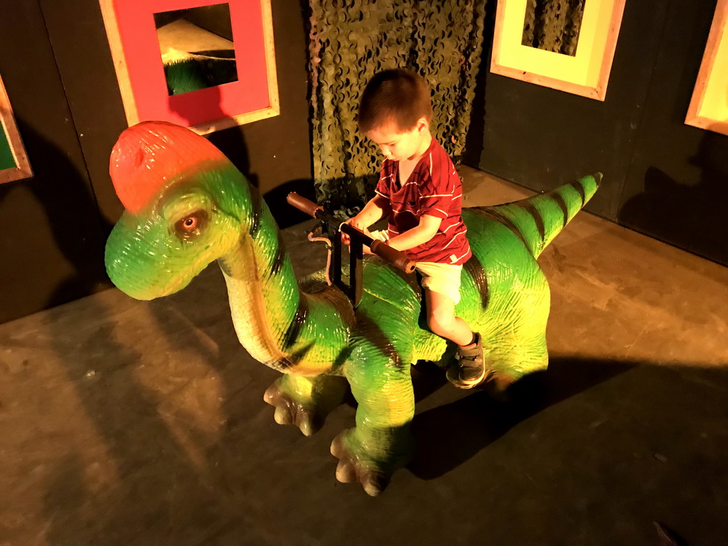 Max on a Brachiosaurus car at the World of Dinos exhibition at the Jaarbeurs building