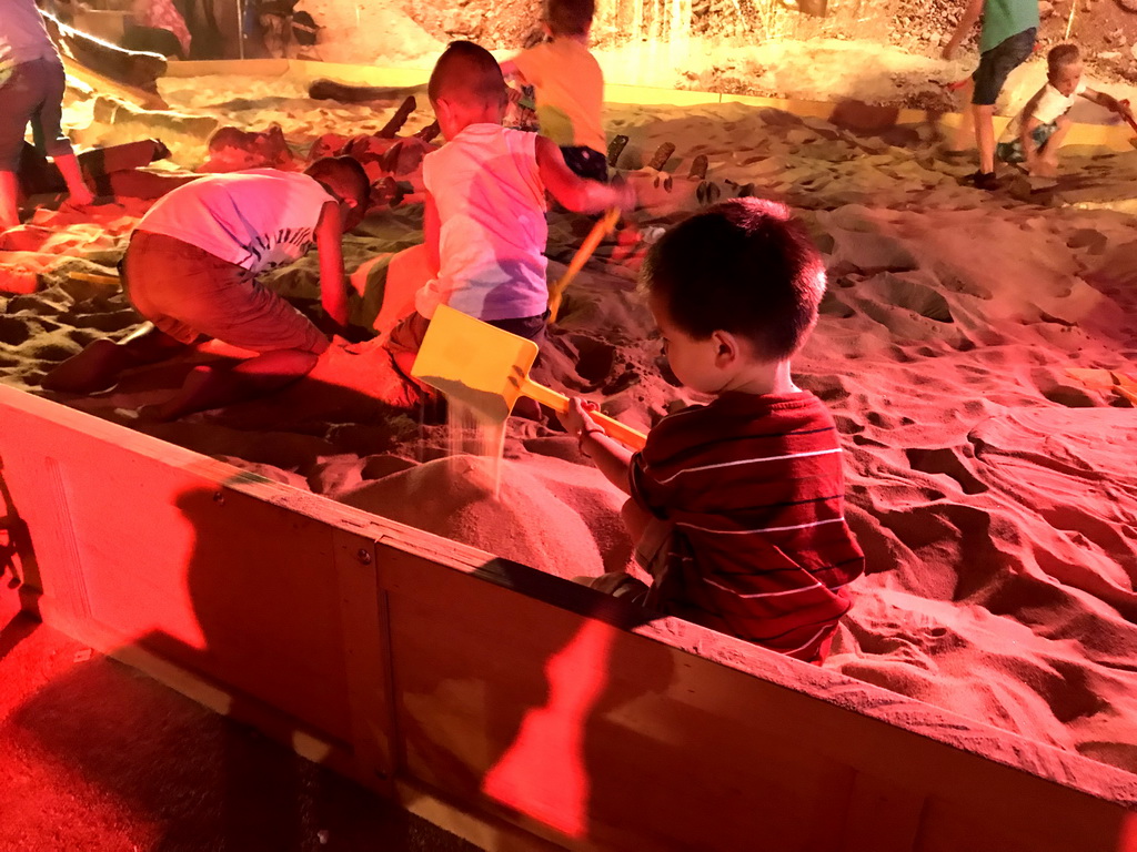 Max at the excavation playground at the World of Dinos exhibition at the Jaarbeurs building