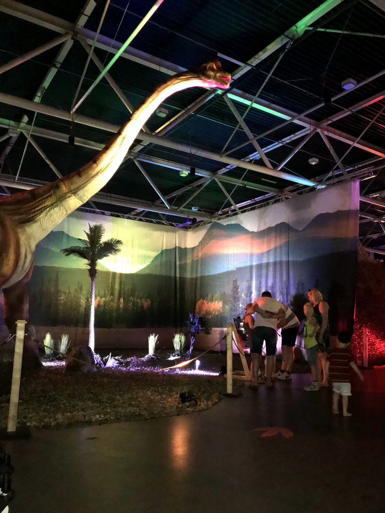 Max with a Diplodocus statue at the World of Dinos exhibition at the Jaarbeurs building