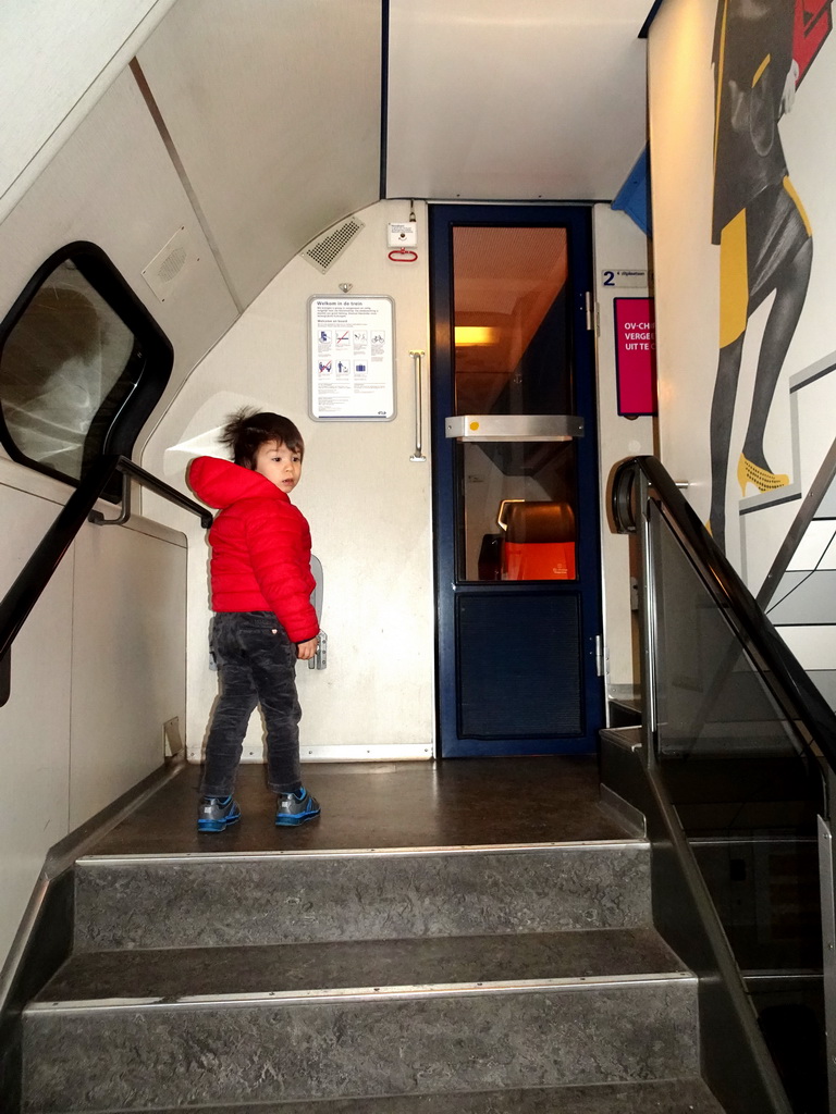 Max in a train at the `Treinen door de Tijd` exhibition at the Werkplaats hall of the Spoorwegmuseum