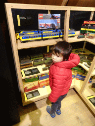Max with scale models of trains at the Modellenmagazijn exhibition at the Spoorwegmuseum