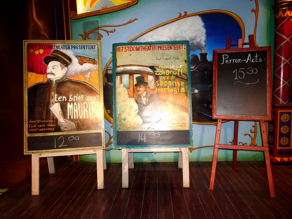 Signs in front of the Stoomtheater at the Droomreizen attraction at the Werkplaats hall of the Spoorwegmuseum