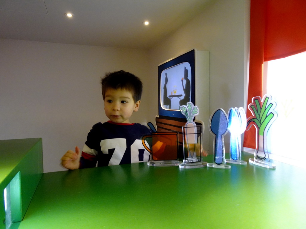 Max in the living room of Nijntje`s House at the ground floor of the Nijntje Winter Museum