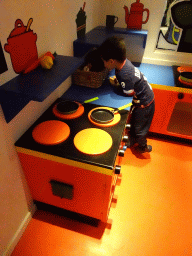 Max in the kitchen of Nijntje`s House at the ground floor of the Nijntje Winter Museum