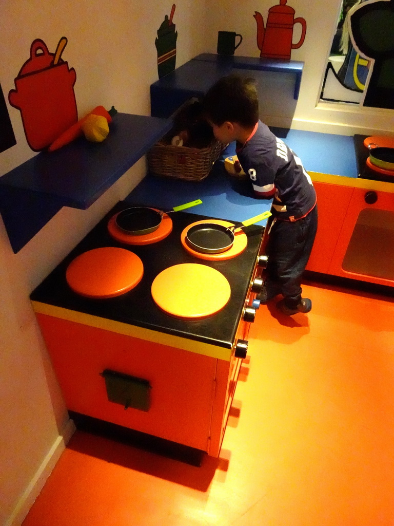 Max in the kitchen of Nijntje`s House at the ground floor of the Nijntje Winter Museum