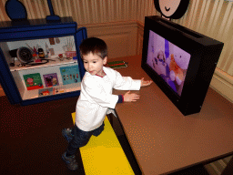 Max playing doctor at the Hospital Room at the ground floor of the Nijntje Winter Museum