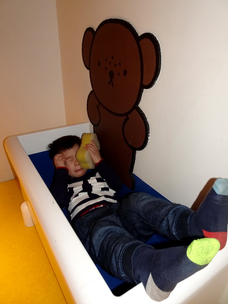 Max in the bathtub at the bathroom of Nijntje`s House at the ground floor of the Nijntje Winter Museum